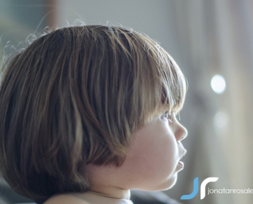 small boy watching tv photo