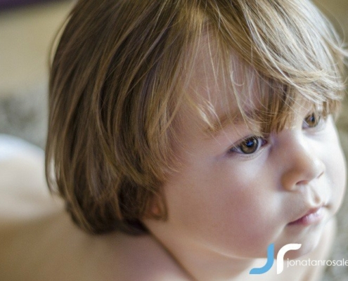 small boy looking tv photo