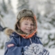 Cute boy smiling in the snow